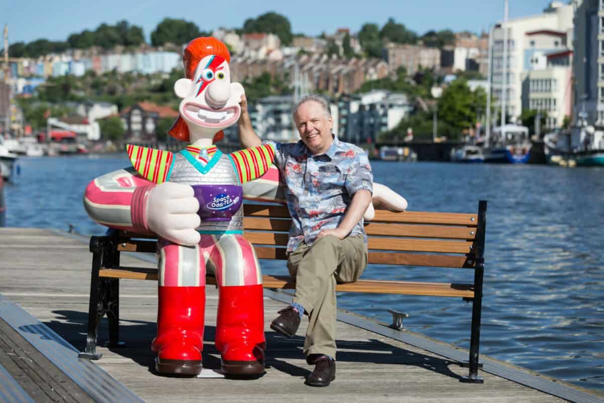 nick park sat with a wallace sculpture