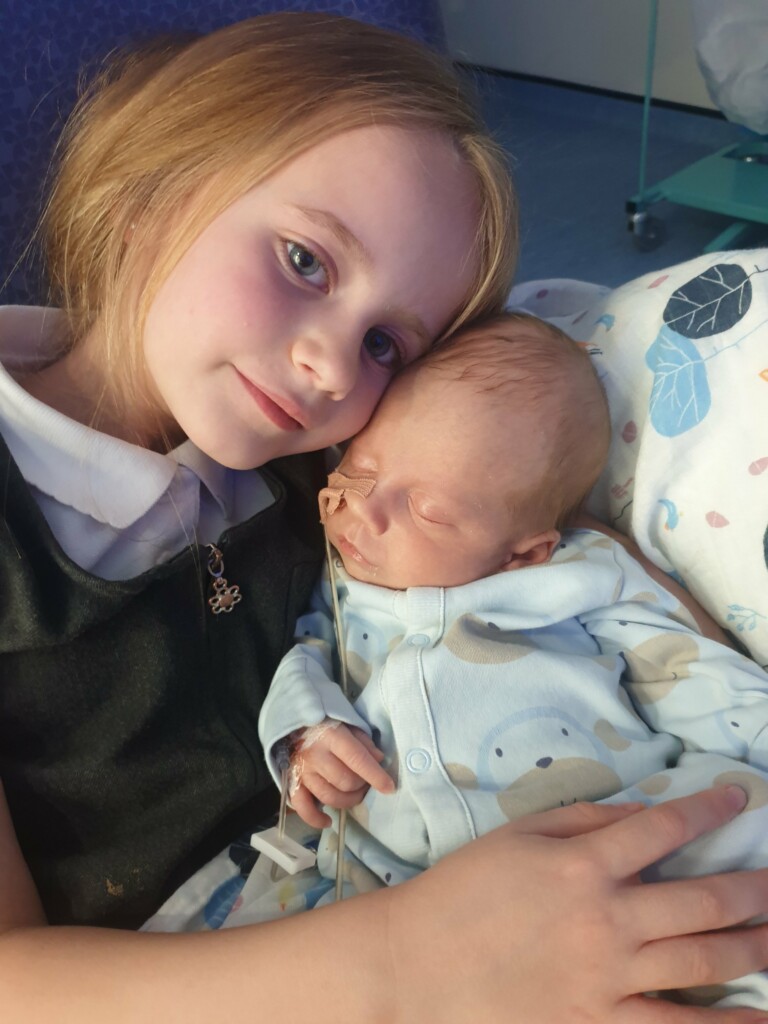 Baby Jaxon pictured with his sister in St Michael's NICU, Bristol. 