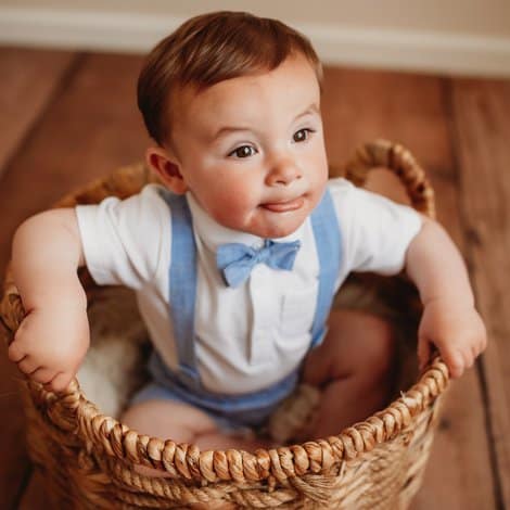 child sat in basket