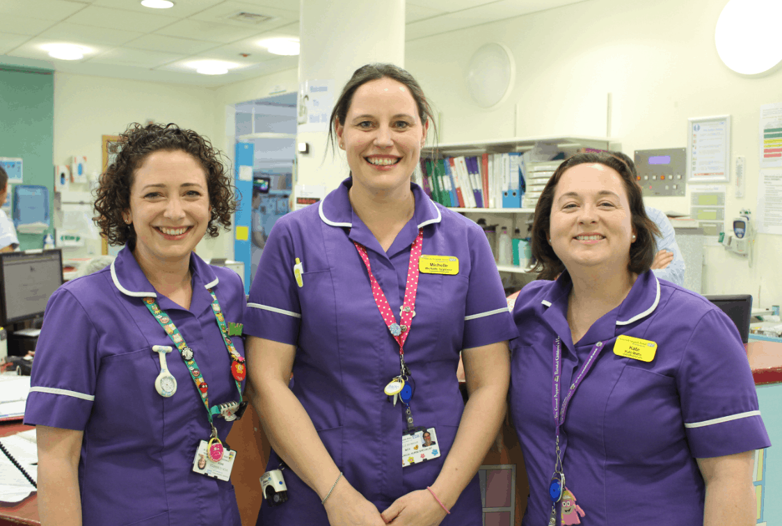 nurses at the children's hospital smiling