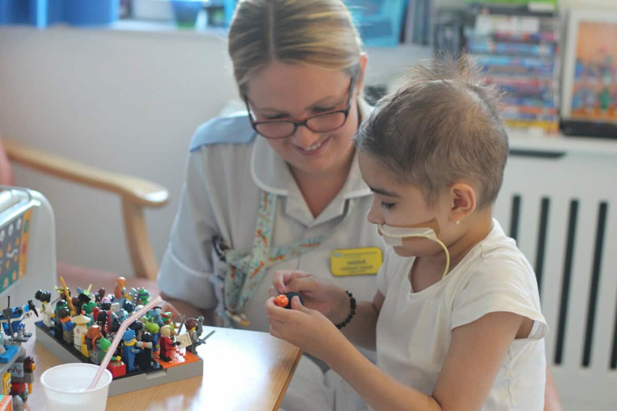 child in hospital playing