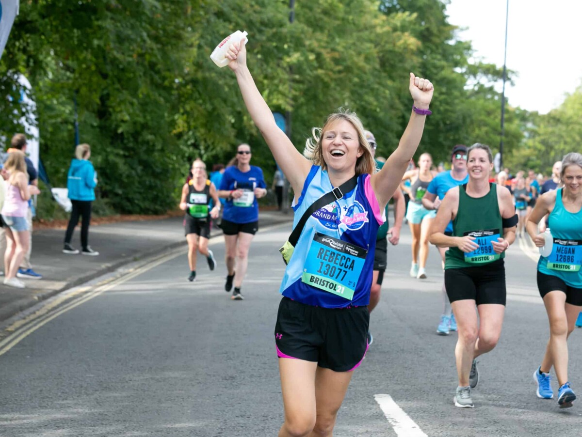 Woman running a race to advertise for the Cardiff Half