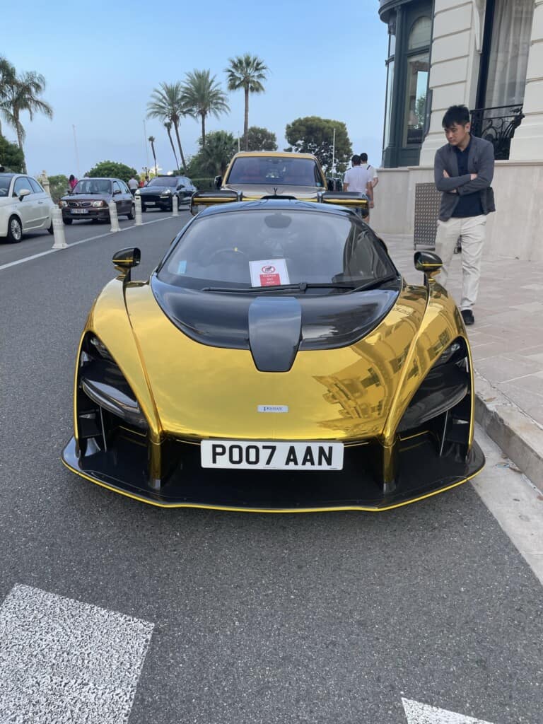 An image of a gold supercar.