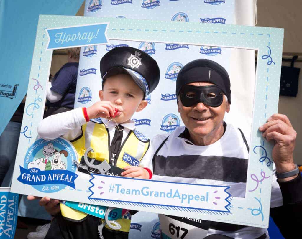 A family taking part in the Great Bristol Family Run for The Grand Appeal and Cots for Tots in fancy dress
