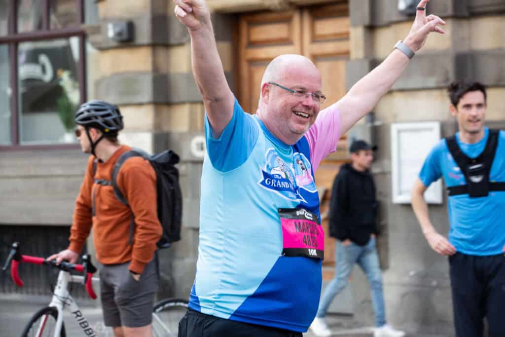 Man happy running the Great Bristol 10k for The Grand Appeal