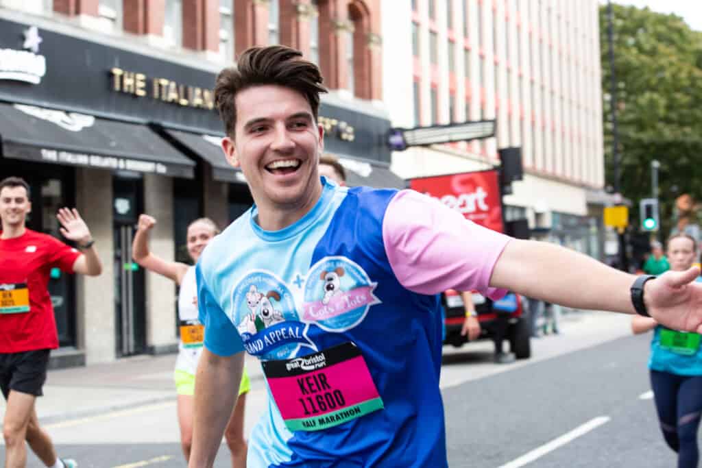 Man happy runnin ghte Bristol 10k for The Grand Appeal