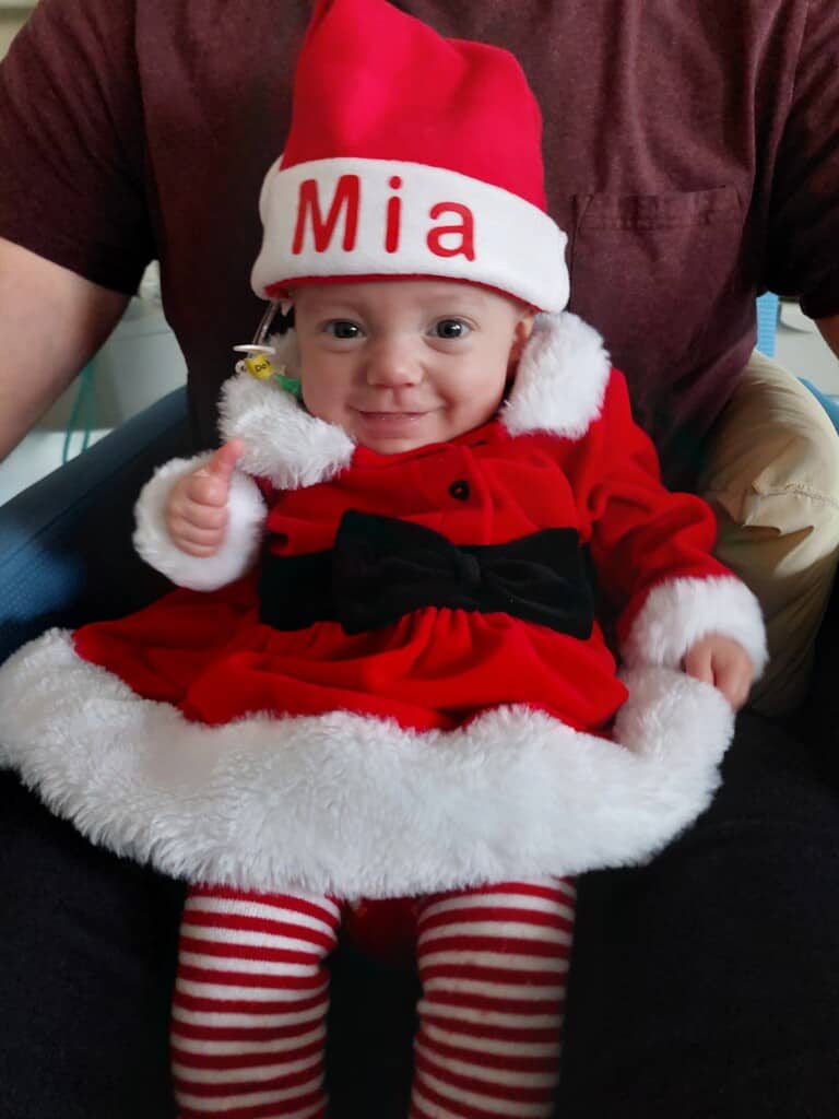 Create a Christmas light display as part of 'Shine Bright for Bristol Children's Hospital' for children like Mia.