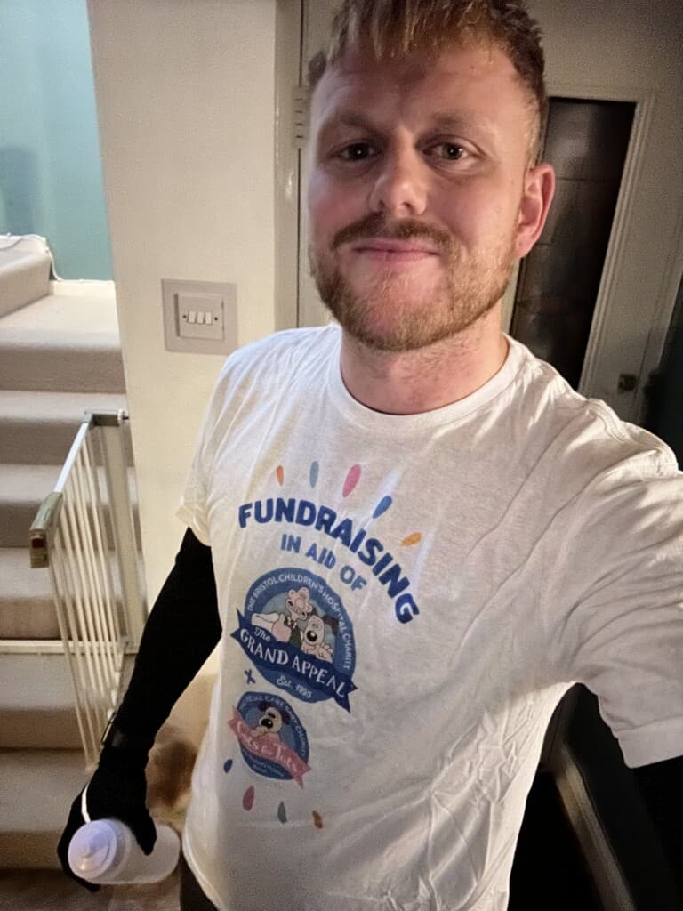 Dan in his 'fundraising in aid of Cots for Tots' t-shirt