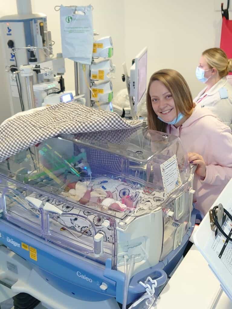 Tommy in care at Bristol Children's Hospital, with his Mum, Lisa. 