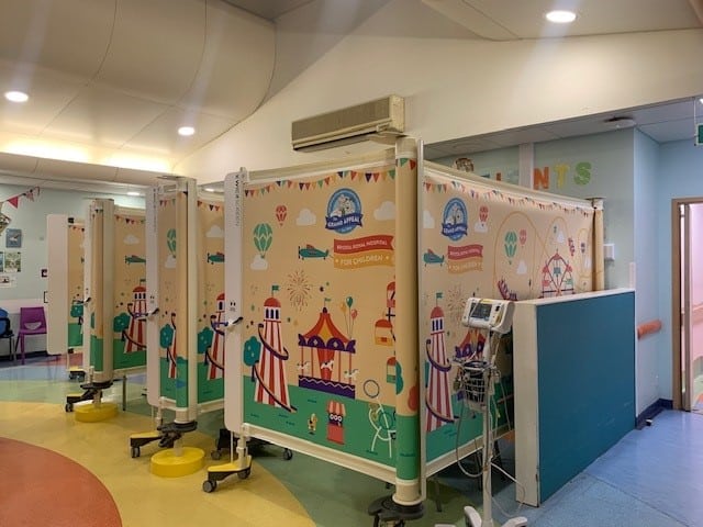 Privacy screens featuring colourful designs in the style of Carousel Outpatients - theme park rides, carousels and flags