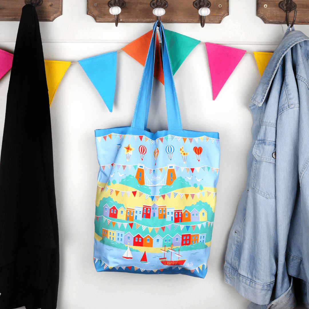 'Inspired by Bunty' tote bag features design of a colourful Bristol scene based off a Gromit Unleashed sculpture.