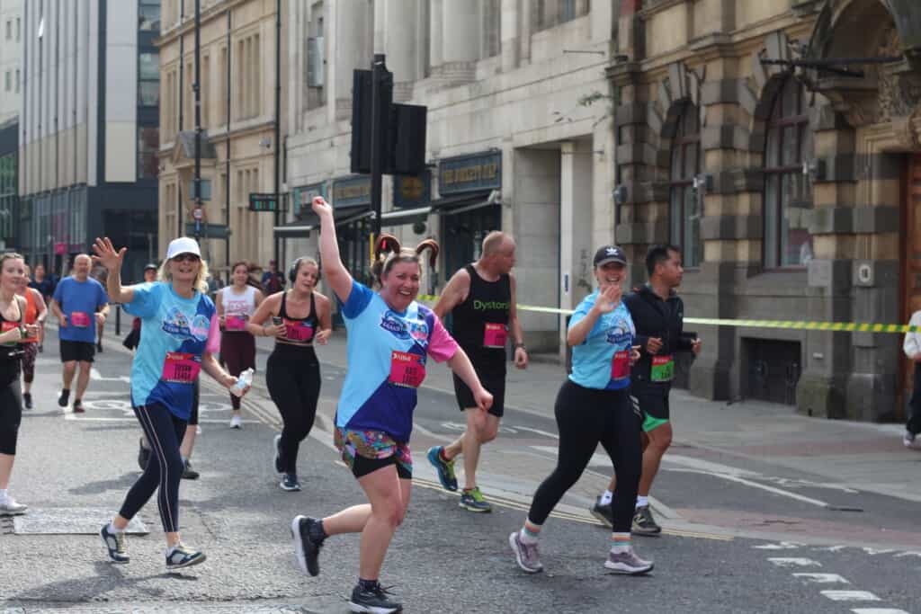 Meg running the Bristol 10k in memory to raise money for alex's star tribute fund.
