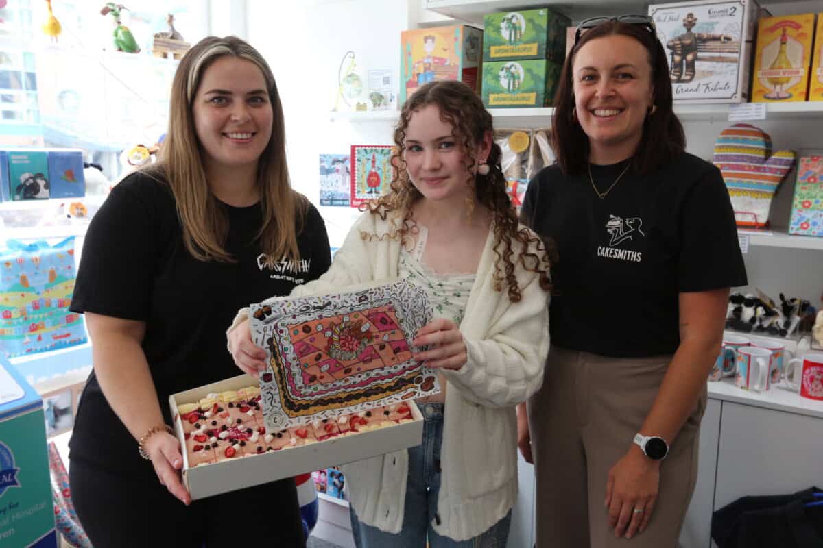 Eva and the Cakesmiths staff with Eva's Strawberry Dream Cake