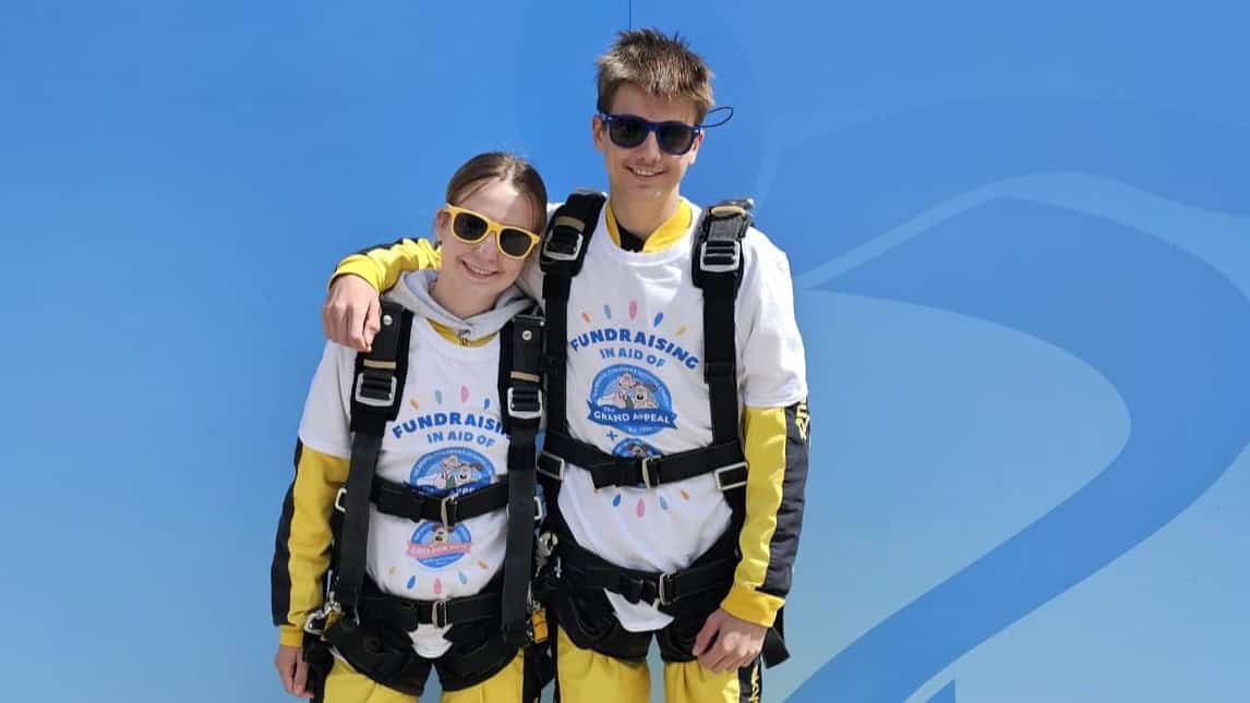 Siblings Hannah and Max in matching skydiving gear