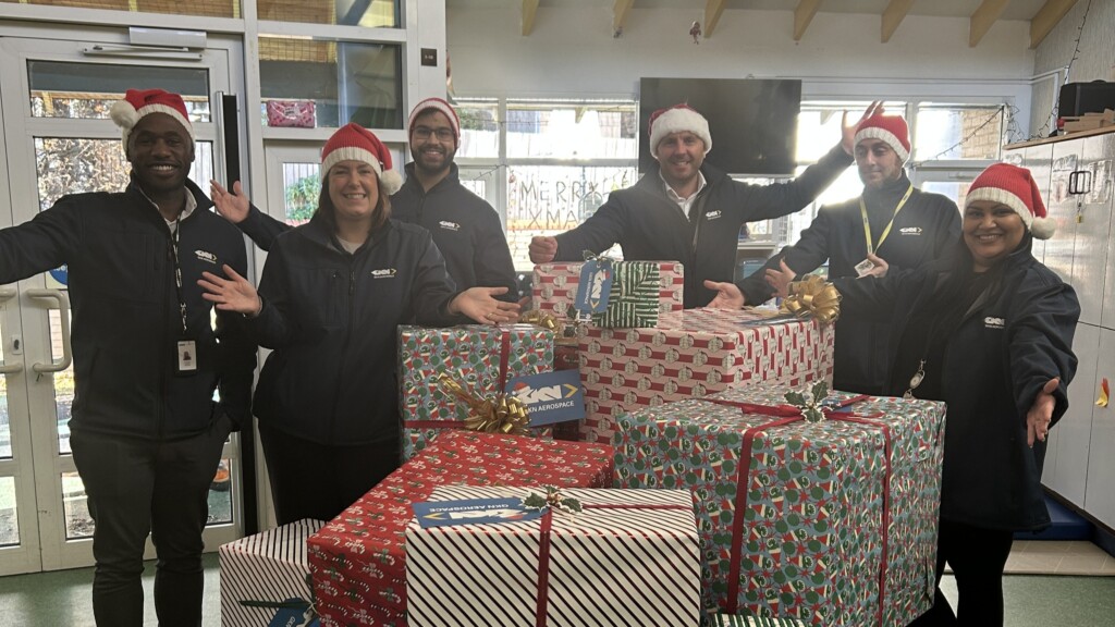 GKN Aerospace staff deliver presents to the Activites Centre.