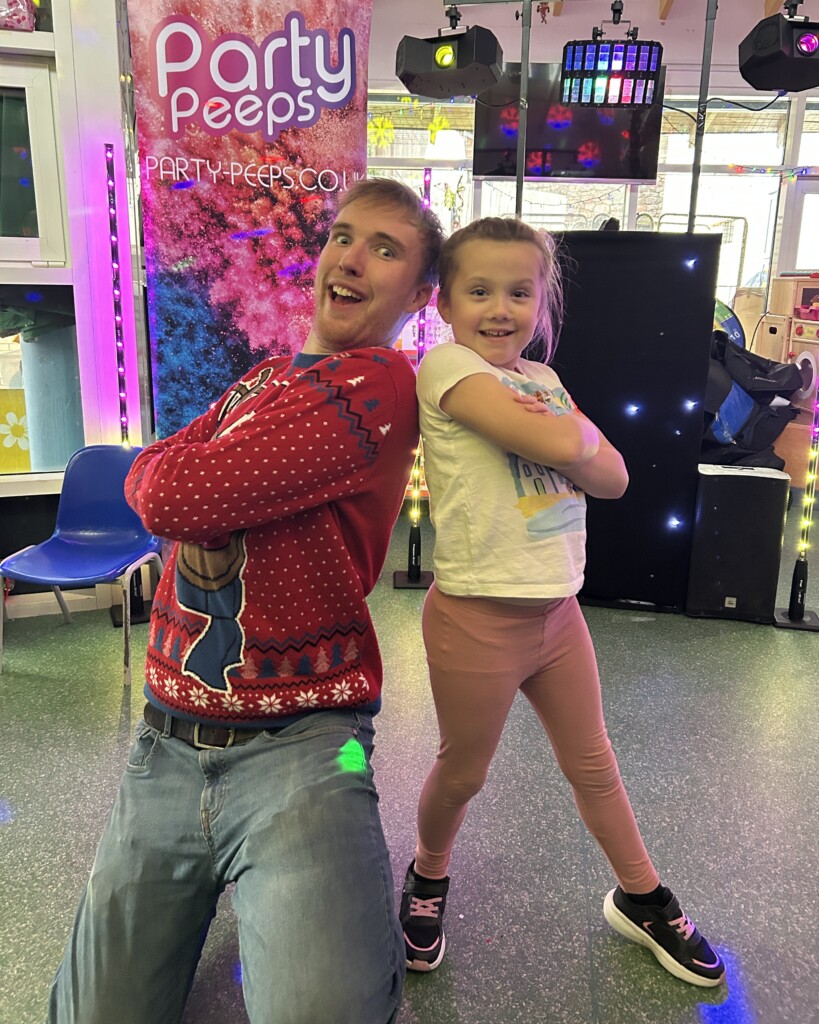 Party Peeps team member posing with patient at Bristol Children's Hospital.