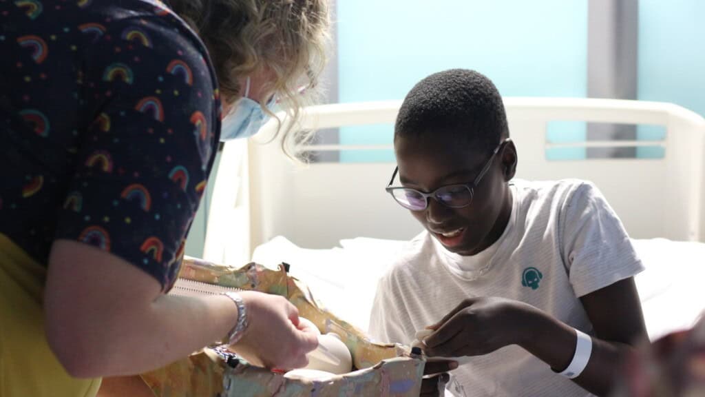 Teenage patient at Bristol Children's Hospital takes part in FIMO workshop.