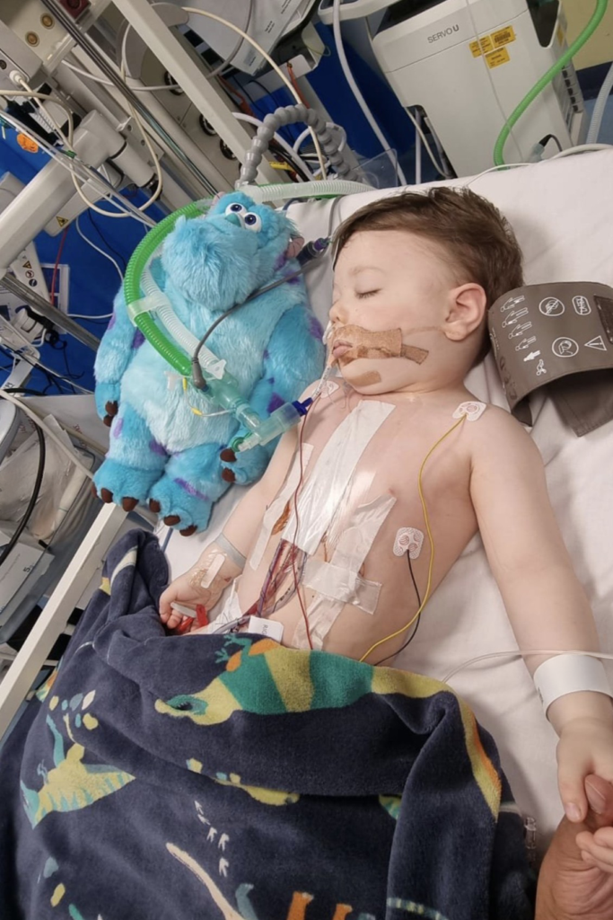 Miles in intensive care after his heart surgery at Bristol Children's Hospital.