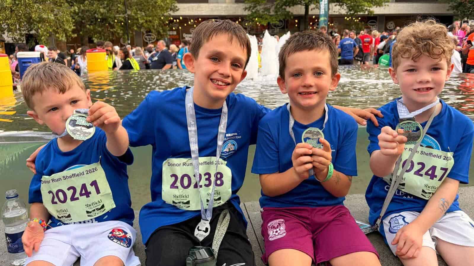 Bristol Children's Hospital team holding medals.