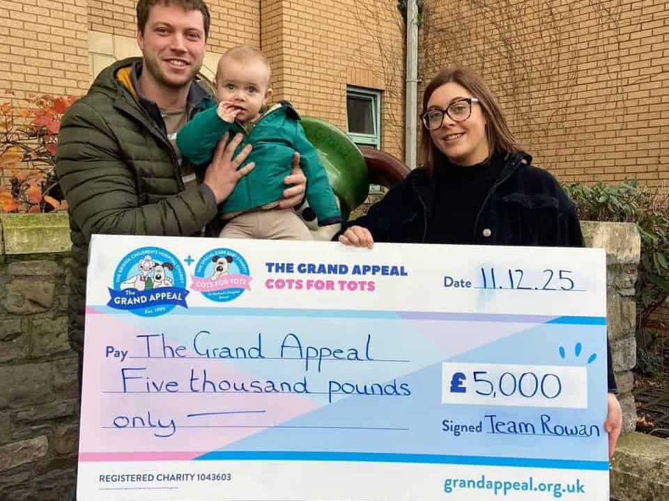 Rowan with his family at The Grand Appeal cheque presentation.